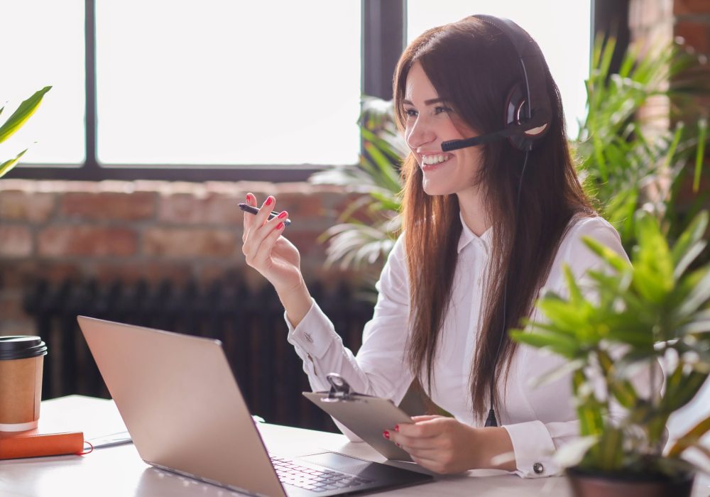 Woman working in call center as dispatcher
